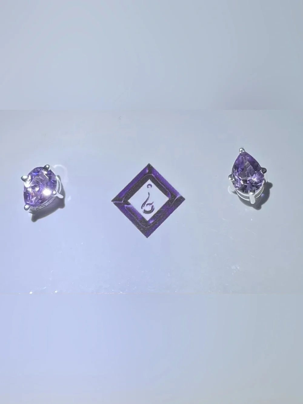 Amethyst pear-shaped studs